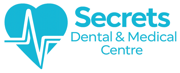 Secrets Dental & Medical Centre logo with heart and heartbeat
