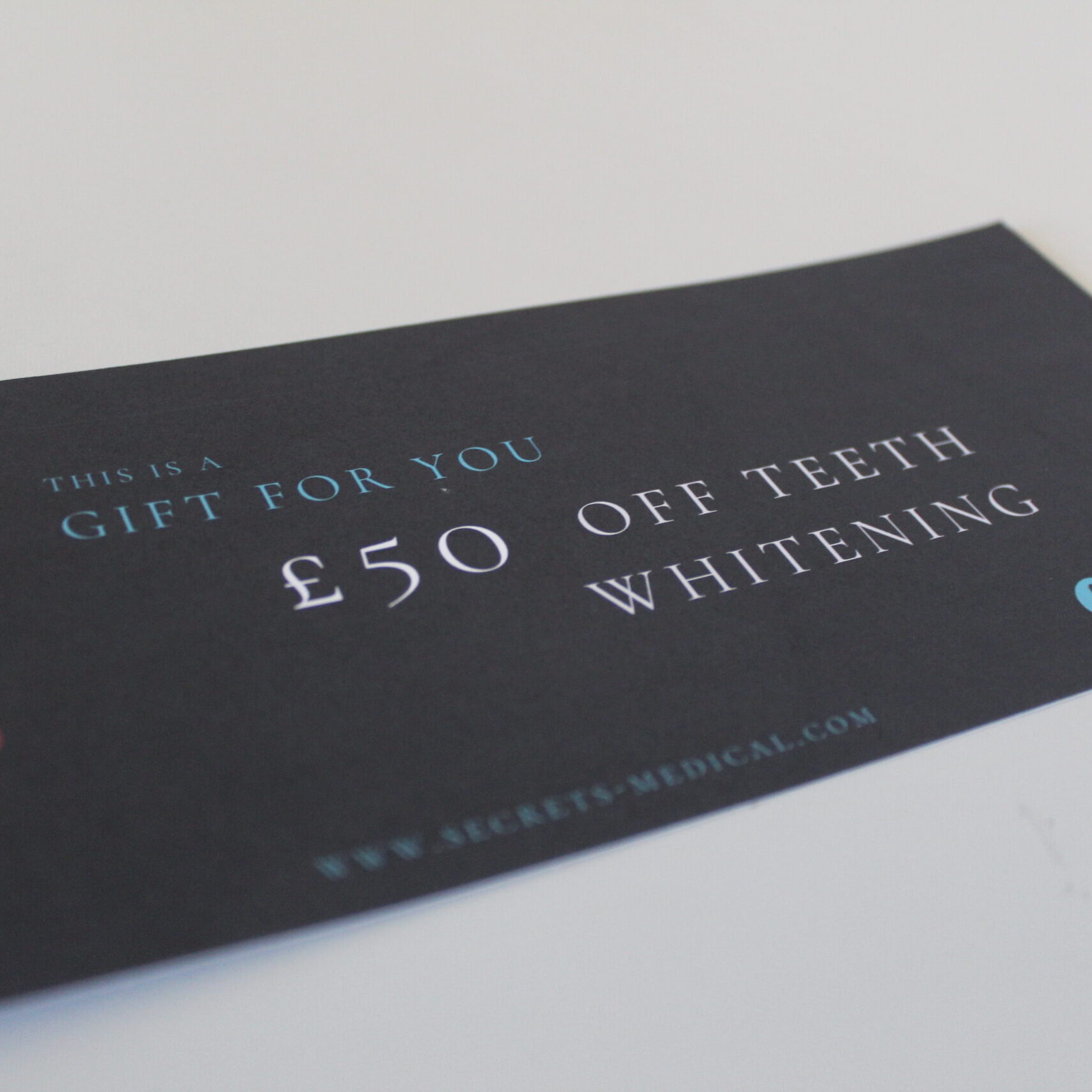 close up of whitening voucher