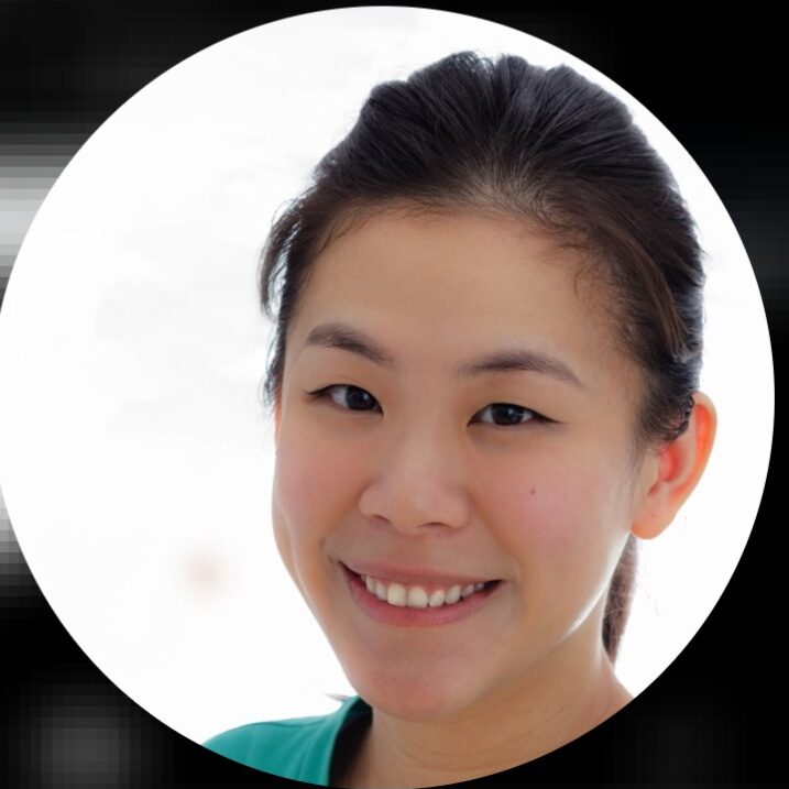 a profile pic image of a smiling woman wearing light make-up